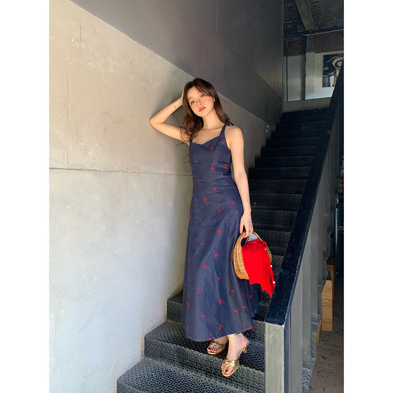 Woman wearing Cowboy Camisole Dress in a sunny park