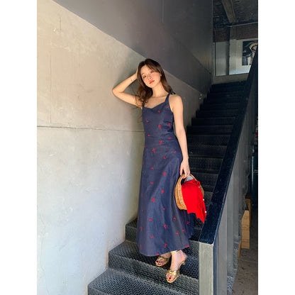 Woman wearing Cowboy Camisole Dress in a sunny park