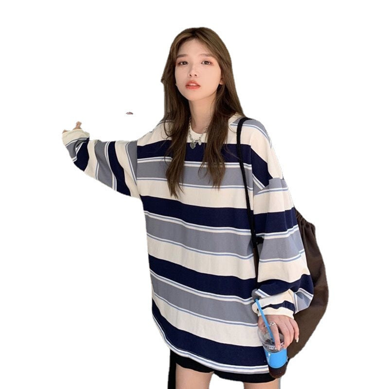 Woman wearing Casual Loose Stripe Long Sleeve T-Shirt in a casual setting
