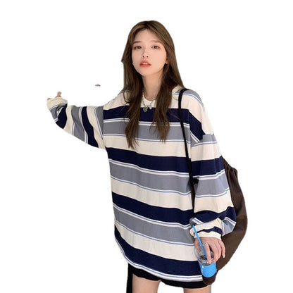 Woman wearing Casual Loose Stripe Long Sleeve T-Shirt in a casual setting