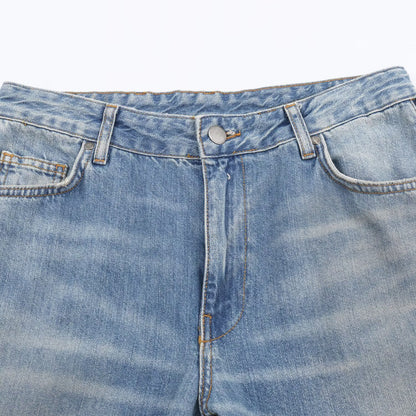 Woman wearing Mid Waist Zipper Jeans in a casual setting