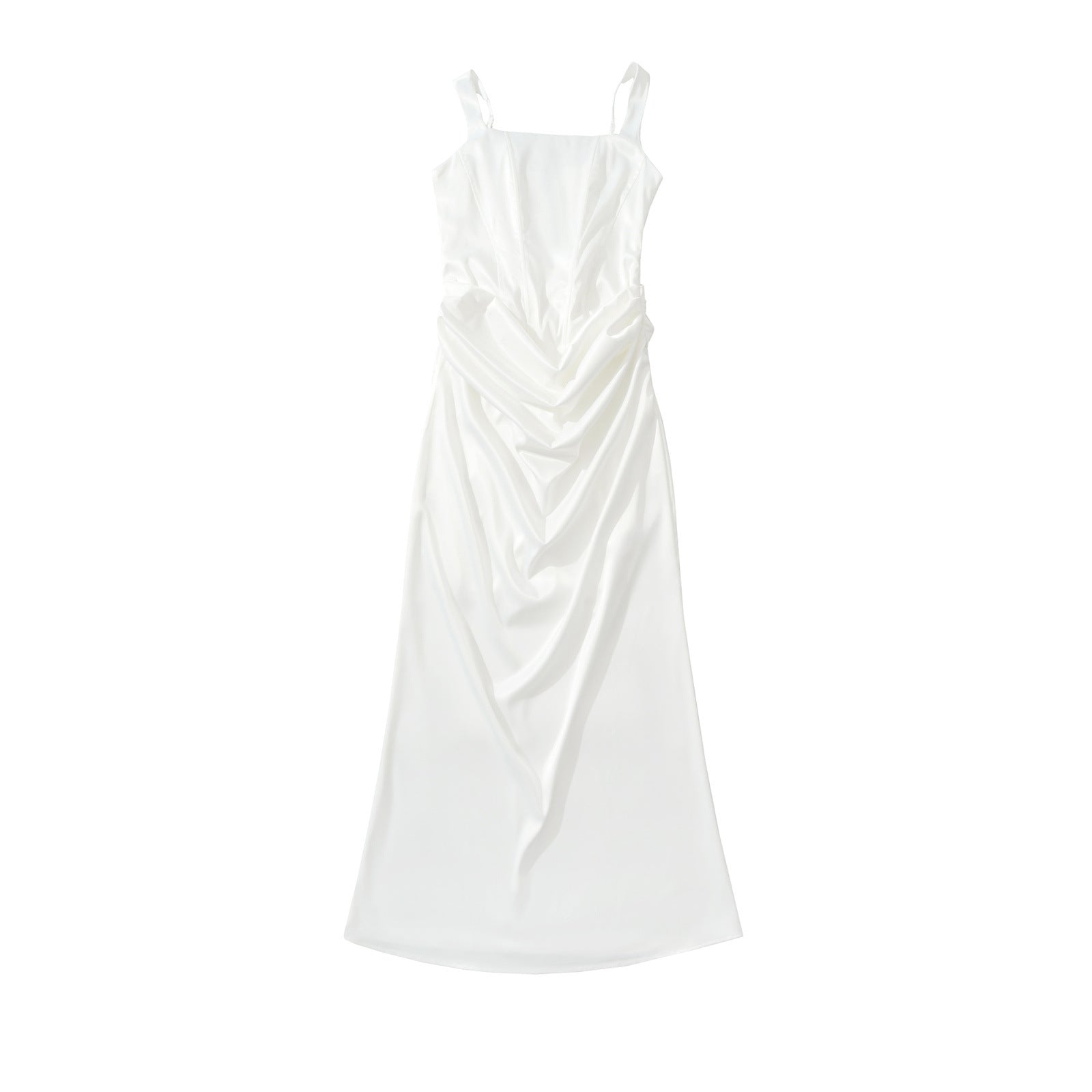 Woman wearing backless camisole dress in a summer setting