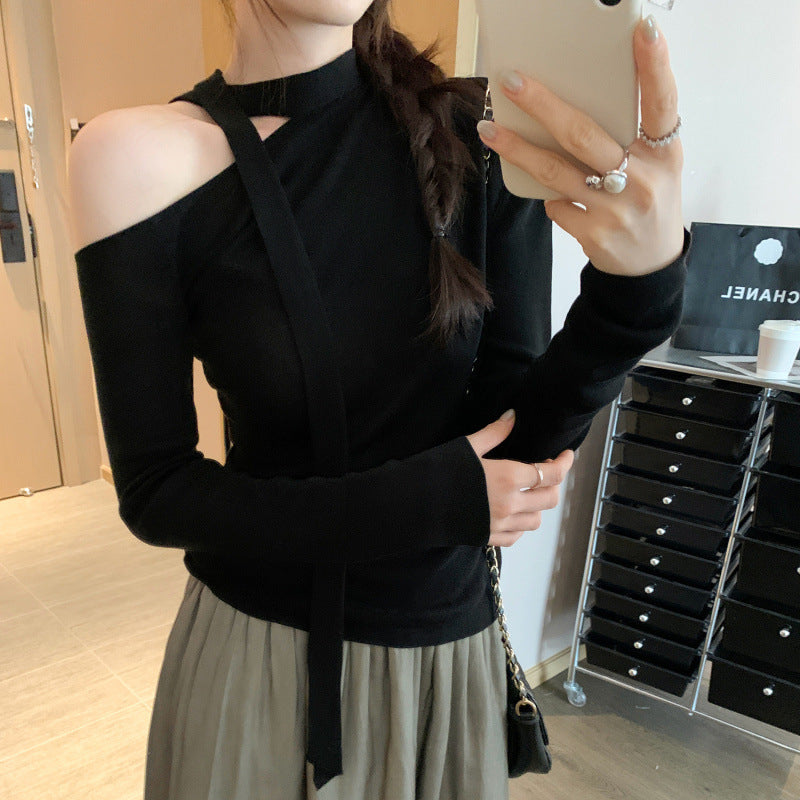 Woman wearing Lace Up Butterfly Long Sleeve Top in a casual setting