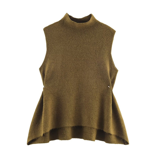 Woman wearing Olive Green Asymmetric Knit Top in a chic outdoor setting