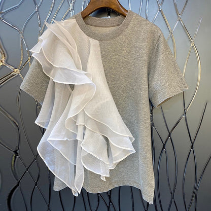 Woman wearing Patchwork Ruffle T-Shirt in a casual summer setting