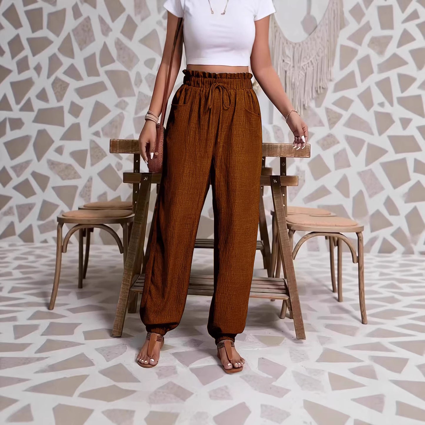 Woman wearing Elastic Solid Color Pants in a casual setting