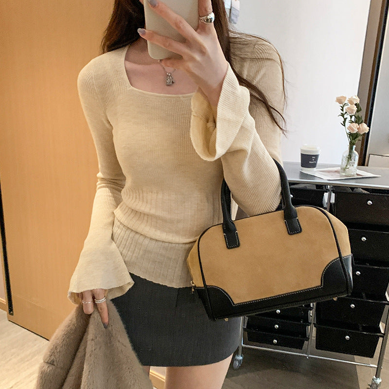 Woman wearing Square Neck Flared Long Sleeve Knit Top in a stylish setting