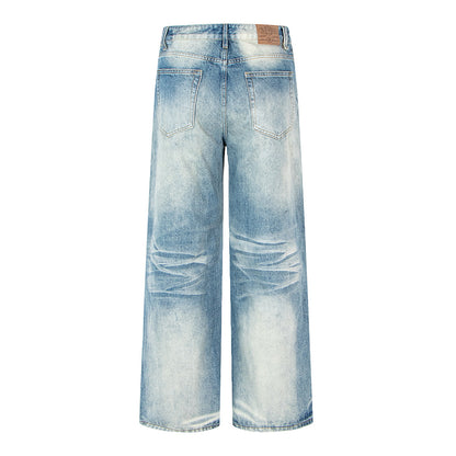 Woman wearing Vintage Distressed Straight Leg Denim Pants in a casual outdoor setting