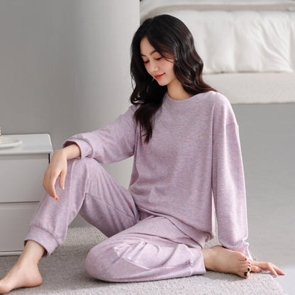 Woman wearing Warm Brushed Sleepwear Set in a cozy home setting