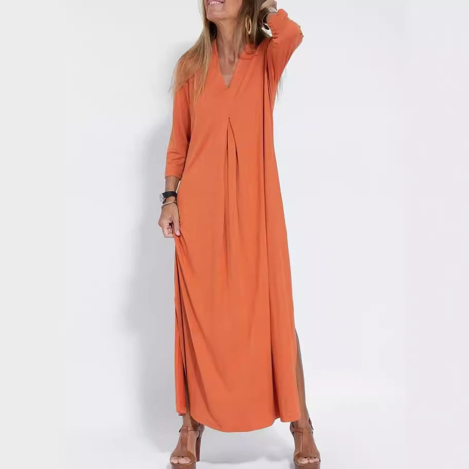 Woman wearing V Neck Three Quarter Sleeve Knit Dress in a stylish urban setting