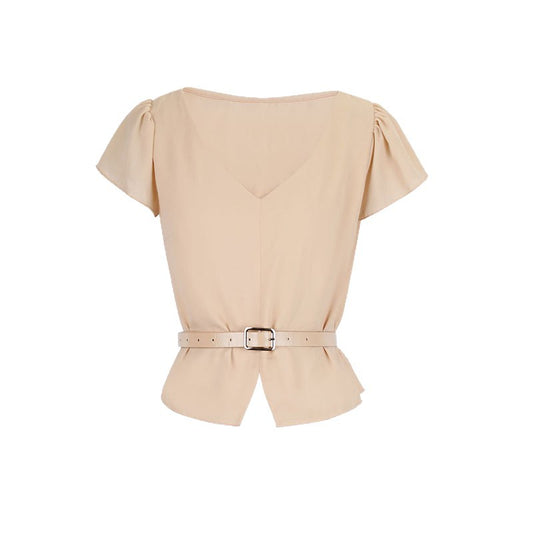 Woman wearing V-Neck Slim Fit Top in a casual setting