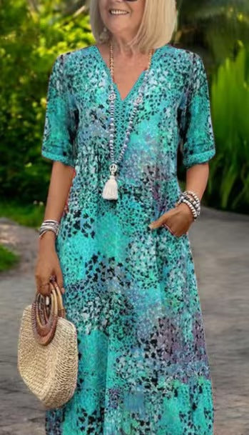 Woman wearing Color Blocked Lace Trim V Neck Short Sleeve Dress in a sunny outdoor setting