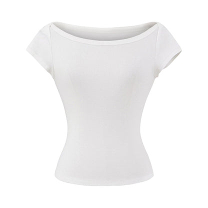 Woman wearing Elegant Short Sleeve Top in a stylish setting