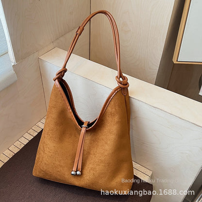 Women's Large Capacity Matte Retro PU Leather Drawstring Shoulder Tote Bag – Back View | TajStylo
