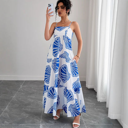 Woman wearing Printed Sleeveless Layered Maxi Dress in a sunny beach setting