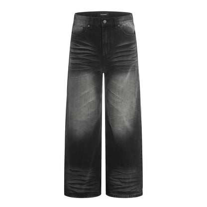 Woman wearing Distressed Black Washed Denim Straight Leg Pants in a street setting
