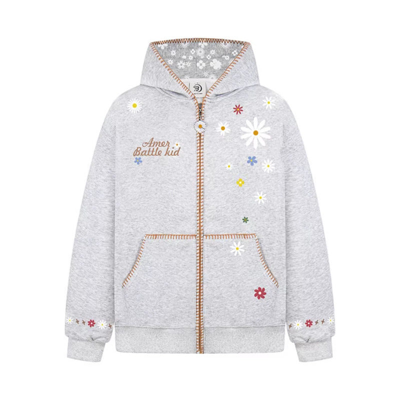 Woman wearing Floral Embroidery Hooded Sweatshirt in a casual setting