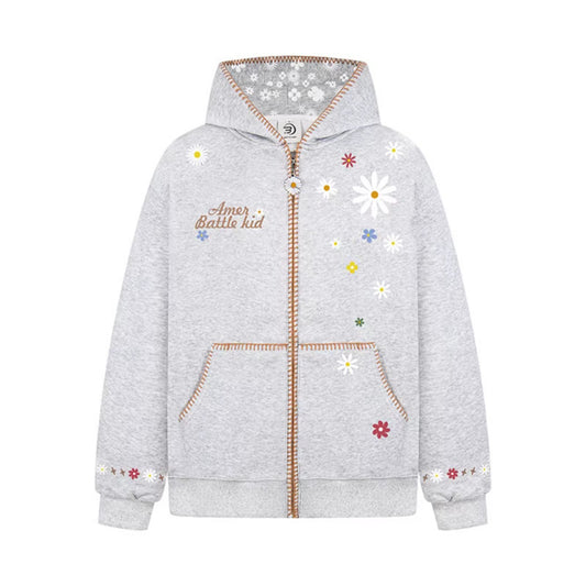 Woman wearing Floral Embroidery Hooded Sweatshirt in a casual setting
