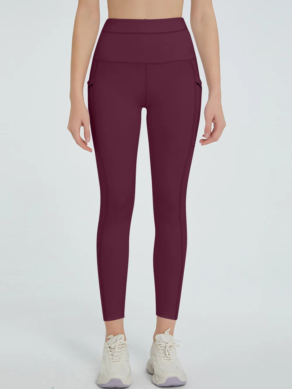Woman wearing High Waist Active Leggings in a fitness setting