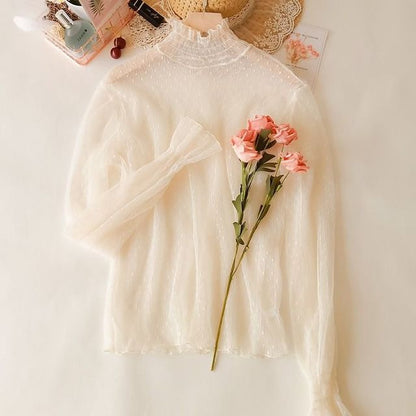 Woman wearing Transparent Korean Lace Blouse in a casual outdoor setting