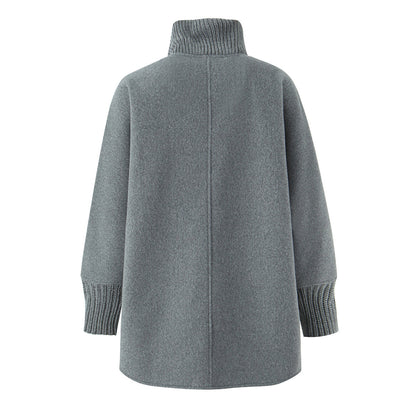 Woman wearing Stand Collar Knitted Patchwork Jacket in a casual setting