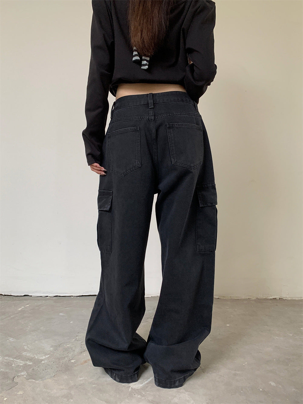 Woman wearing Street Style Cargo Denim Pants in an urban setting