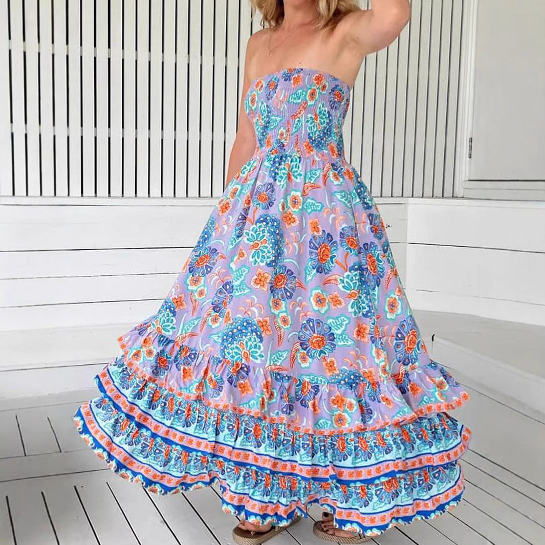 Woman wearing One-Shoulder Floral Ruffle Maxi Dress in a garden