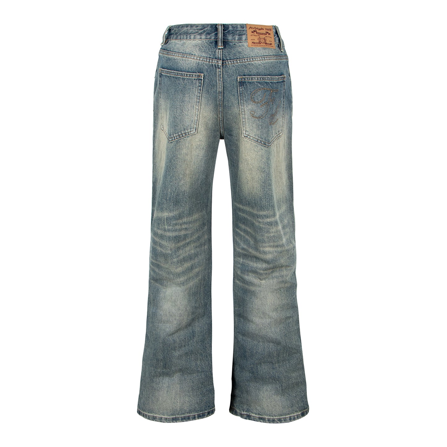 Woman wearing Washed Distressed Cat Eye Denim Pants in a casual setting