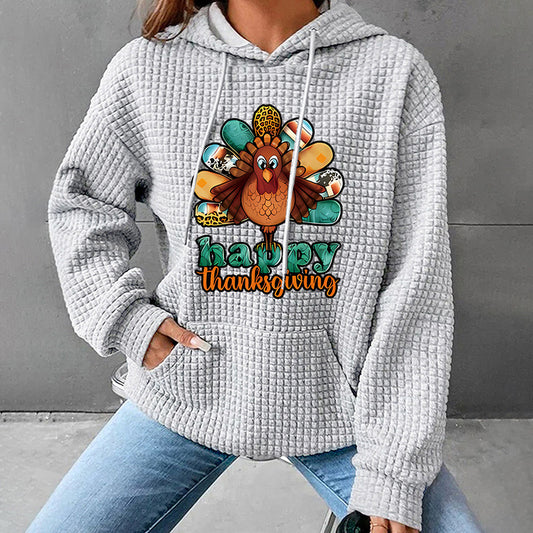 Woman wearing Printed Hooded Top in a casual setting