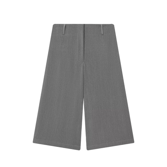 Woman wearing Versatile Long Casual Shorts for women in a sunny park