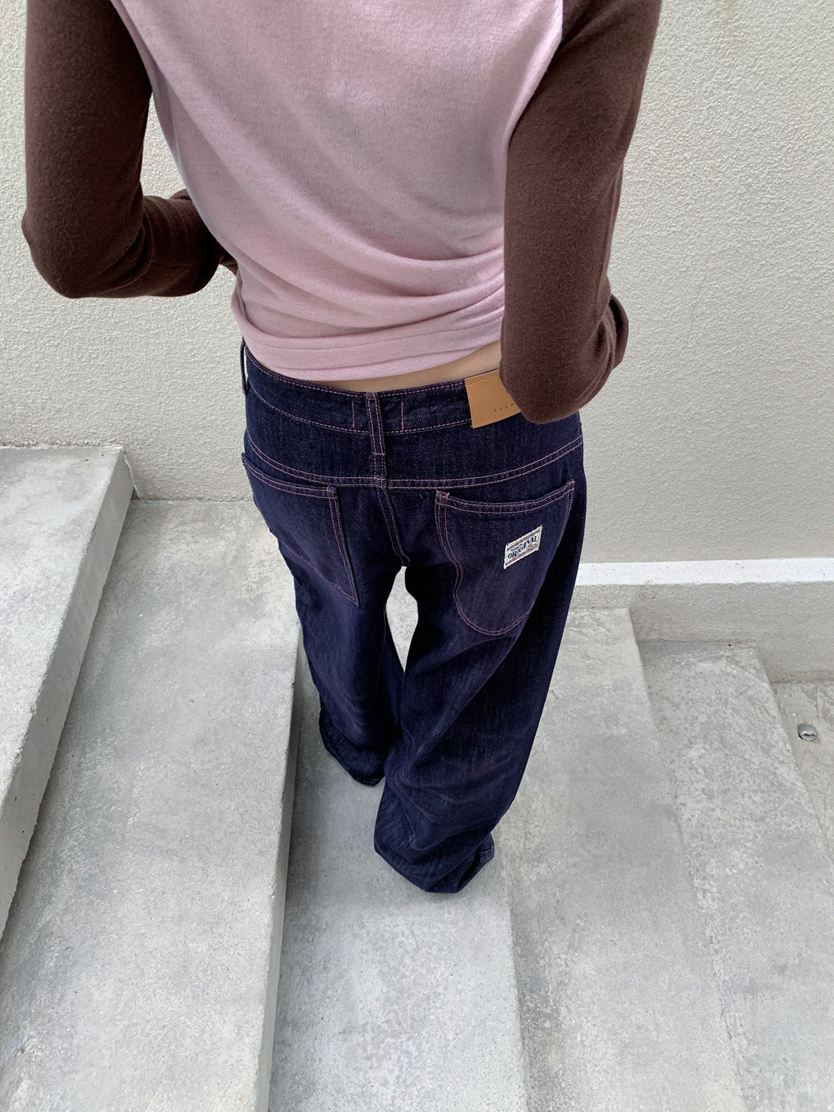 Woman wearing Retro Wide Leg Jeans in a casual setting