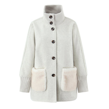 Woman wearing Stand Collar Knitted Patchwork Jacket in a casual setting