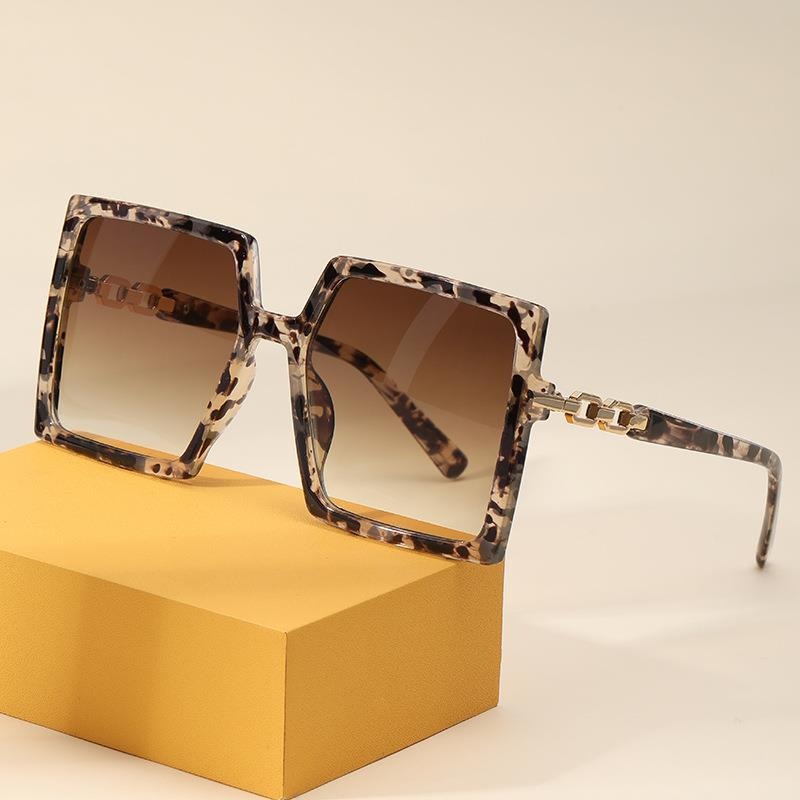 Woman wearing Sporty Sunglasses for Women in outdoor setting