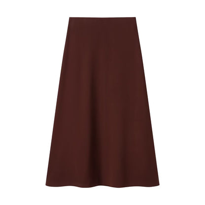 Woman wearing Knot Detail Top and Flute Midi Skirt Set in a sunny outdoor setting