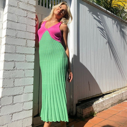 Woman wearing backless knit dress in a casual setting