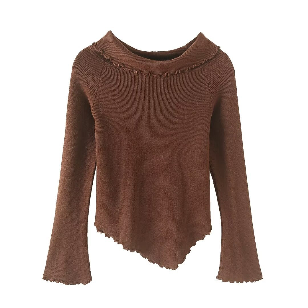 Woman wearing Off Shoulder Long Sleeve Sweater in a casual setting