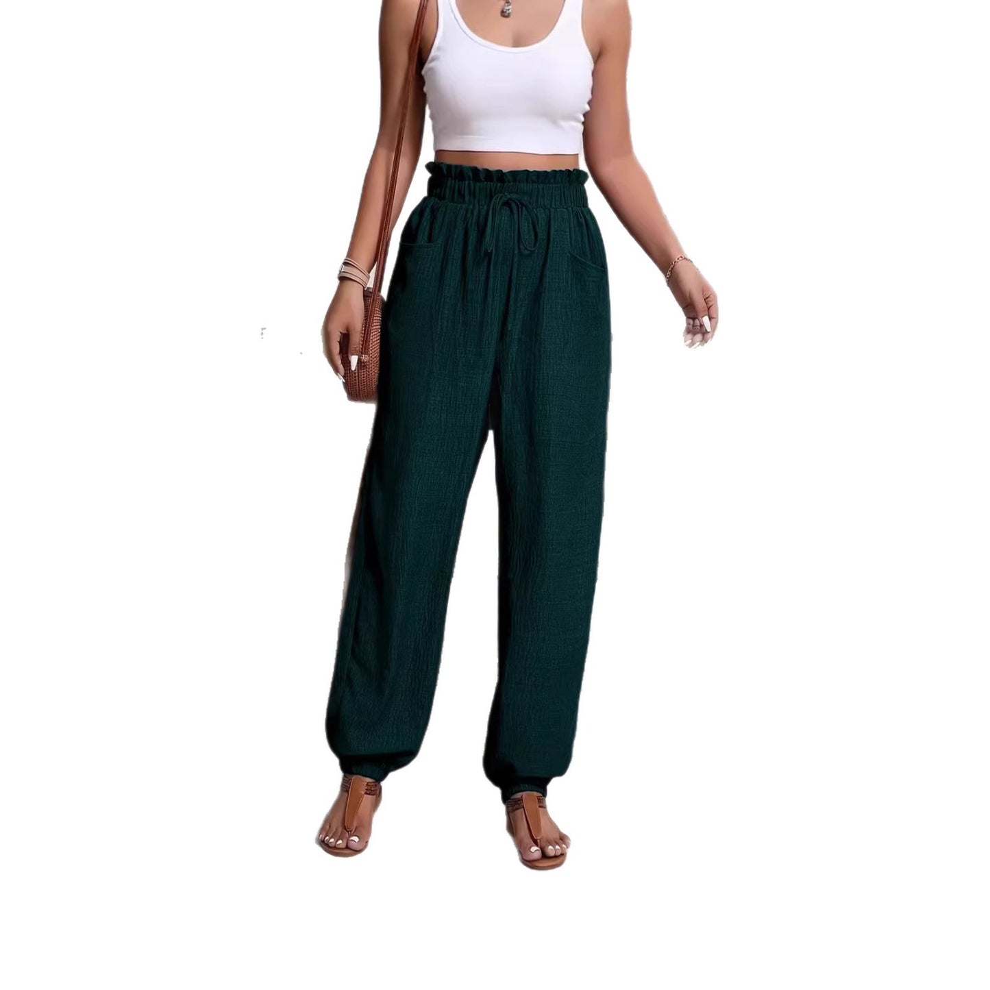 Woman wearing Elastic Solid Color Pants in a casual setting
