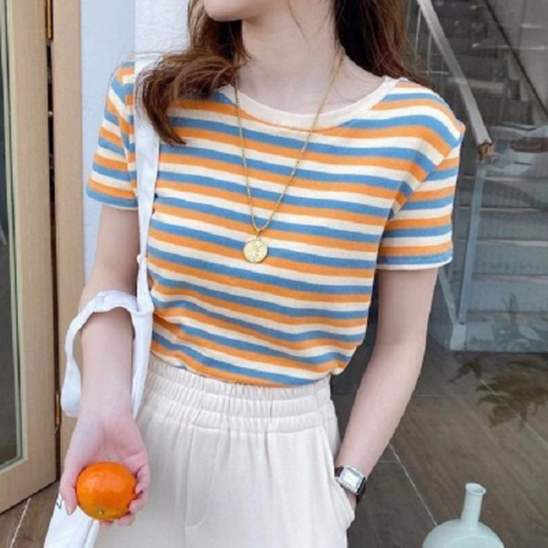 Woman wearing Women’s Stripe Short Sleeve Slim Fit Casual Top in a casual setting