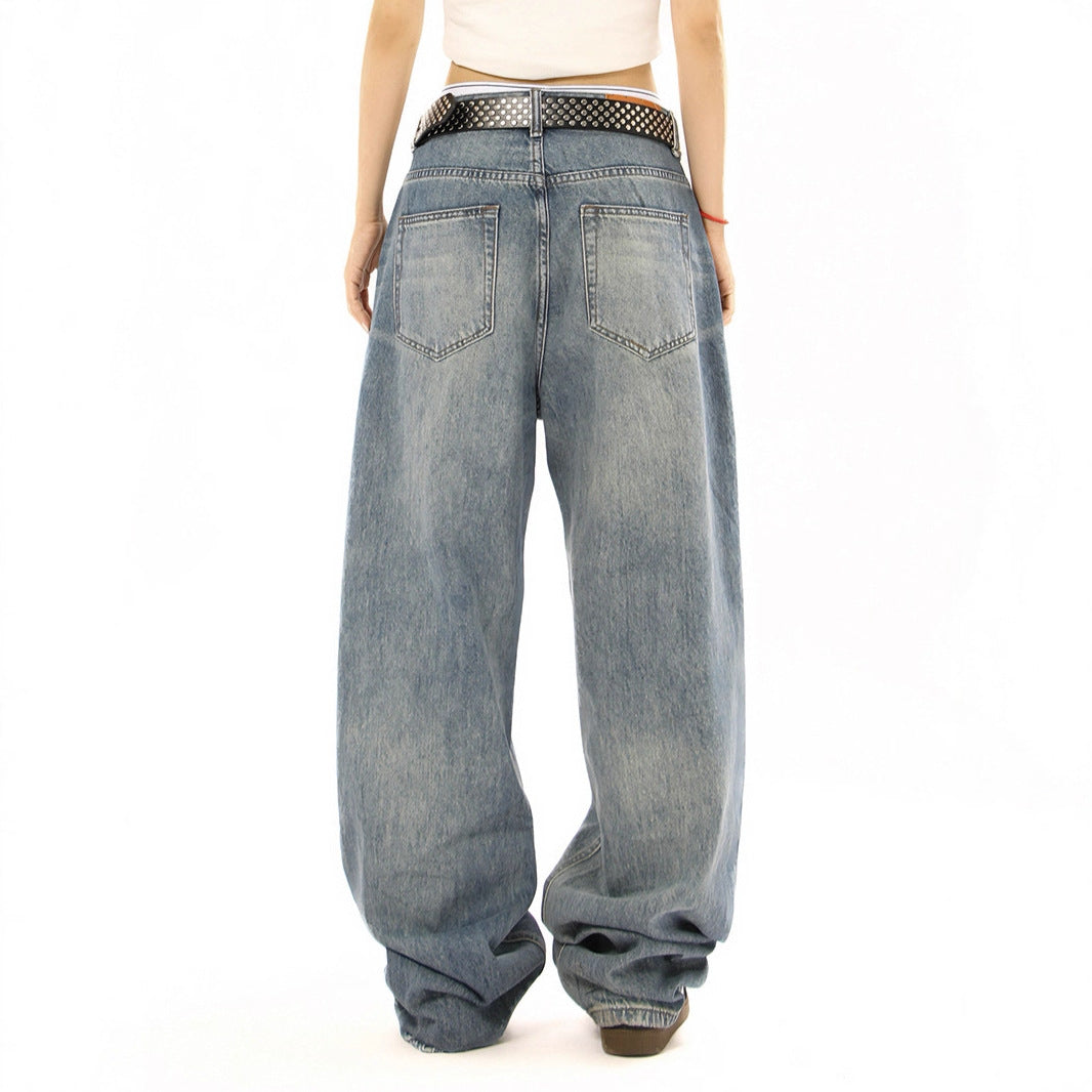 Woman wearing Edgy Square Stud Denim Pants in a street setting