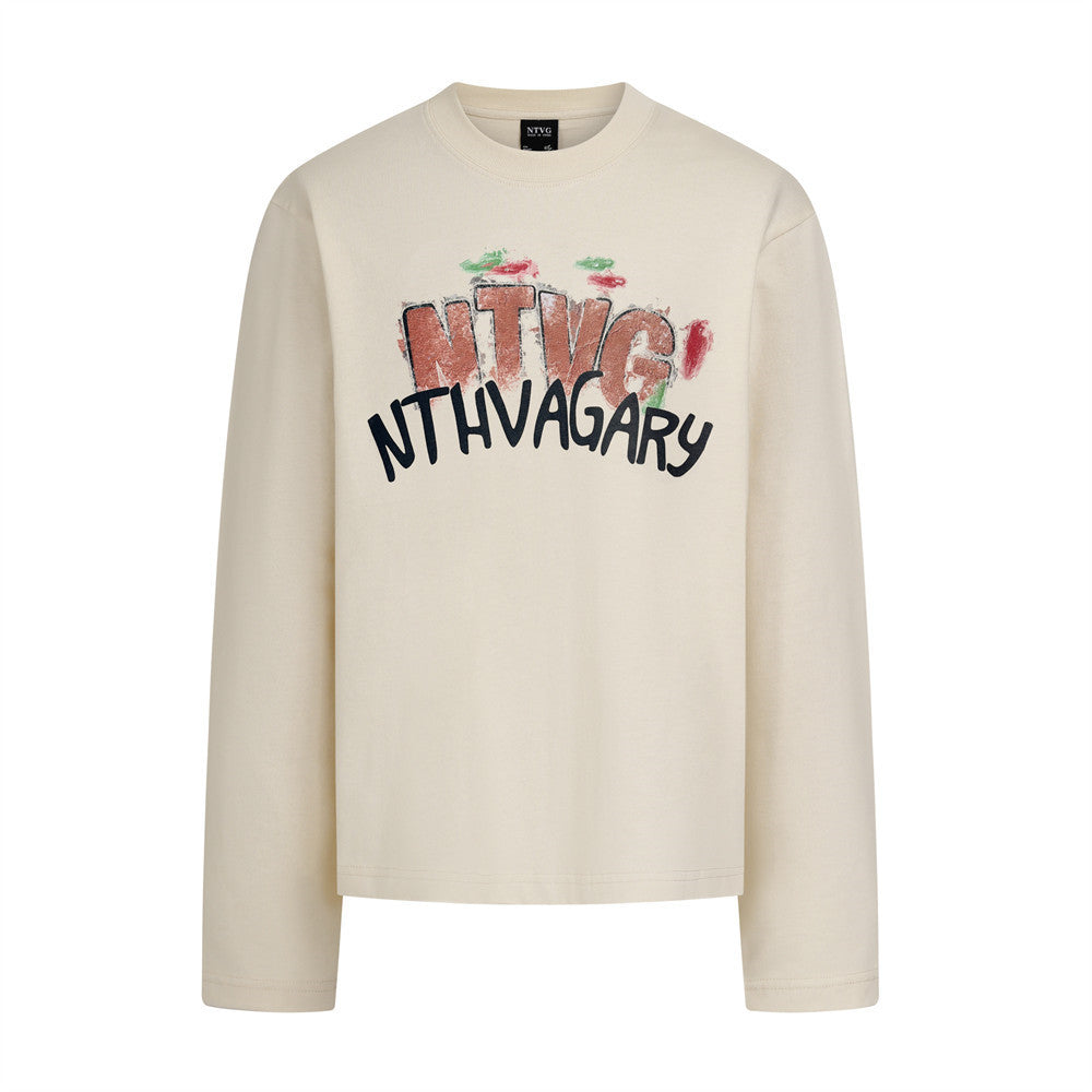 Woman wearing Hand Drawn Graffiti Letter Printed Long Sleeve Shirt in a casual setting