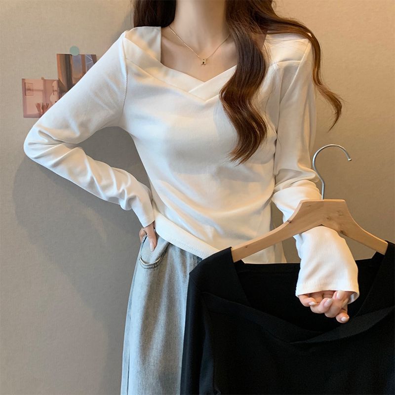 Woman wearing V Neck Long Sleeve Fleece Top in a casual setting