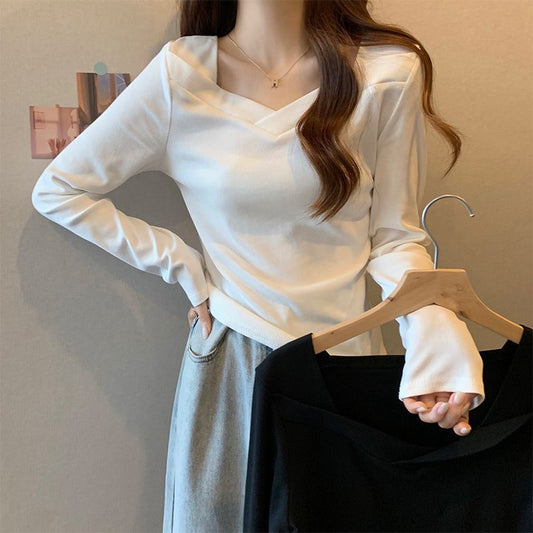 Woman wearing V Neck Long Sleeve Fleece Top in a casual setting