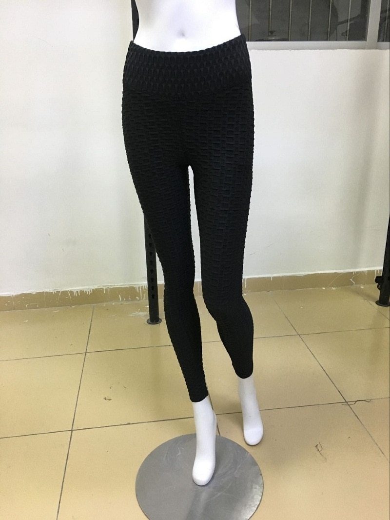 Woman wearing Disko Sport High-Waist Fitness Leggings in an active setting
