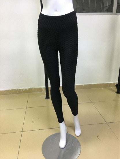 Woman wearing Disko Sport High-Waist Fitness Leggings in an active setting