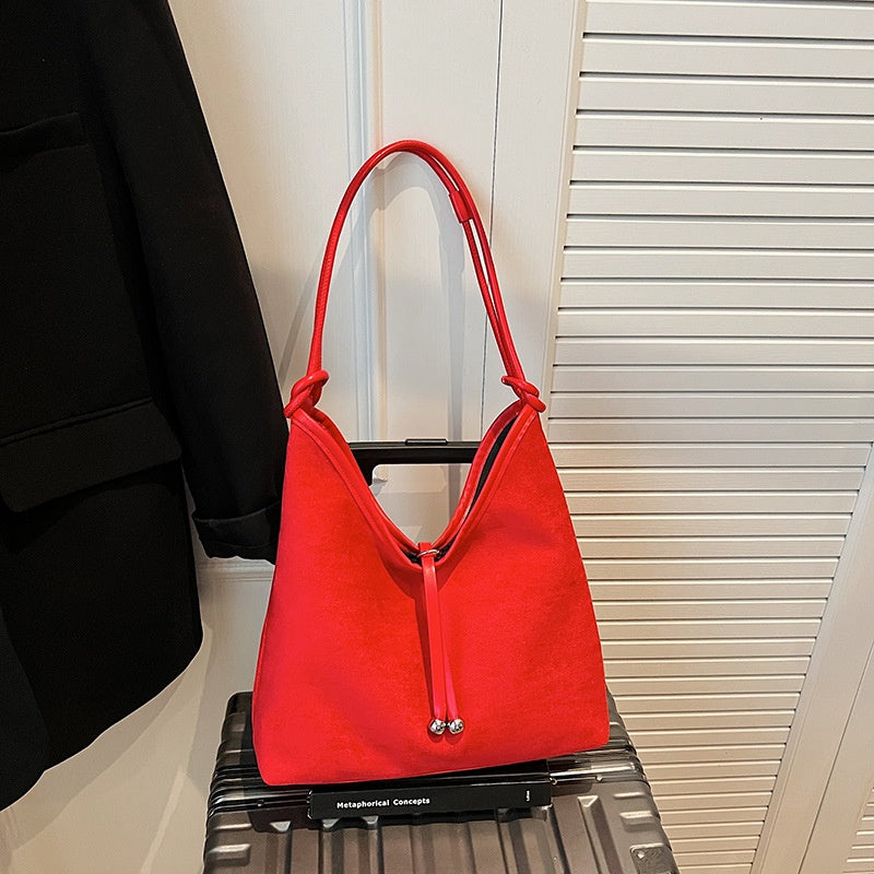 Women's Large Capacity Matte Retro PU Leather Drawstring Shoulder Tote Bag – Model View | TajStylo
