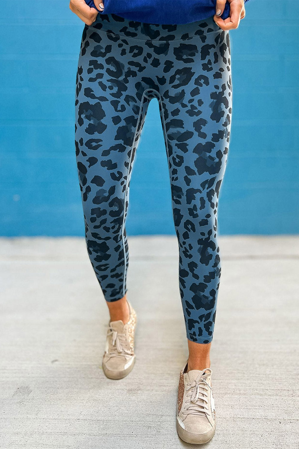 Woman wearing Classic Leopard Print Active Leggings in an urban setting