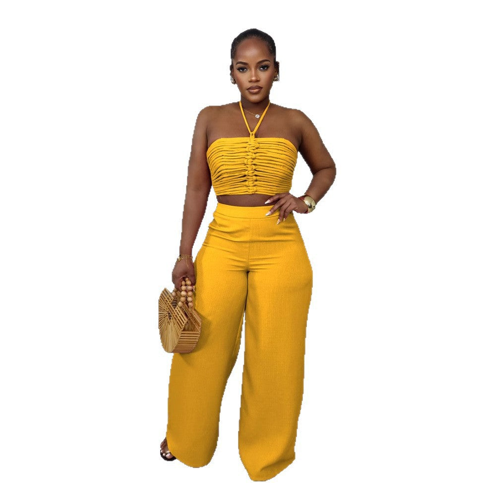 Woman wearing Drawstring Tie-Up Top and High Waist Loose Long Pants Set in a city setting