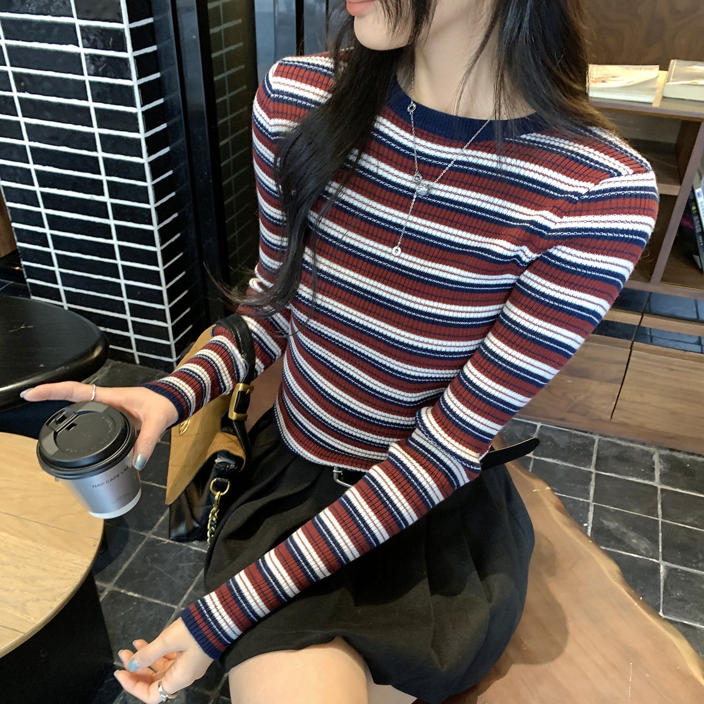 Woman wearing Navy & Red Stripe Slim Fit Knit Innerwear Top in a casual setting