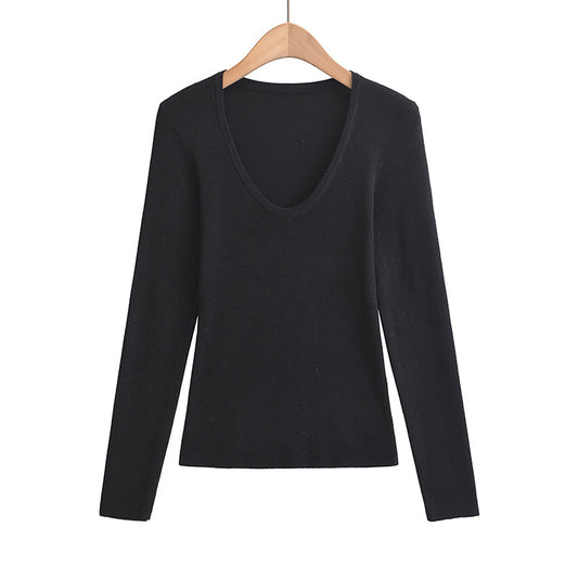 Woman wearing U-Neck Long Sleeve Top in a casual setting