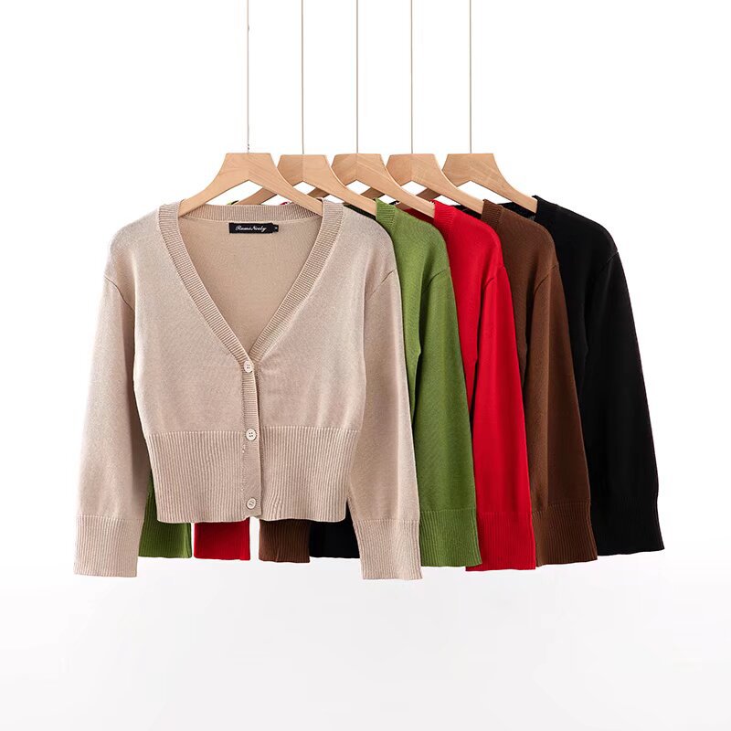 Woman wearing V-Neck Long Sleeve Short Cardigan in a casual setting